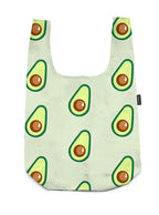 A shopper bag featuring an avocado-themed print, displayed on a white background.