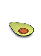 Avocado-shaped trinket tray on a white background.
