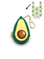2-in-1 bag charm featuring an avocado-shaped design and a shopper bag in an avocado print, displayed on a white background.