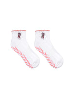 White socks with pink lining, equipped with stay-put grips to prevent slipping, featuring a small ballet-themed print, shown on a white background.