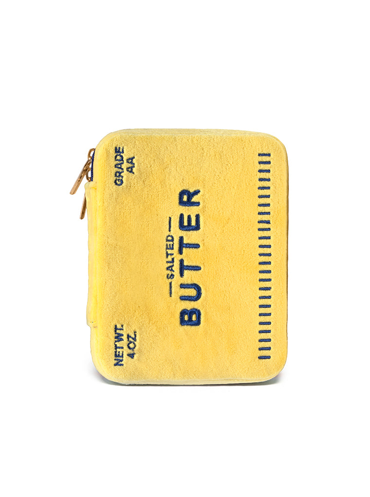 Yellow jewelry zip case featuring a salted butter print, displayed on a white background.
