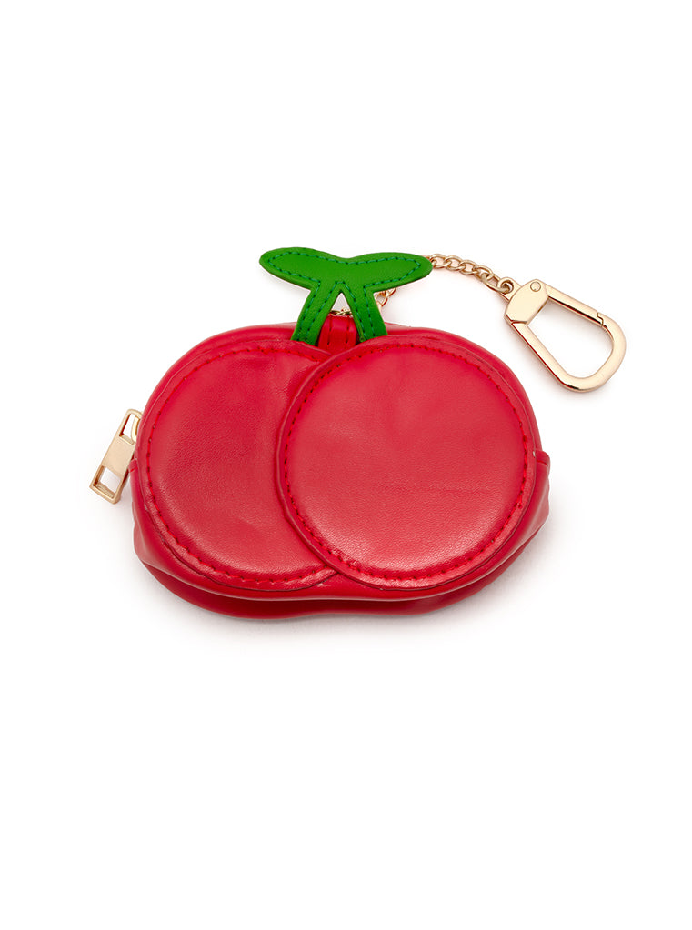 2-in-1 bag charm featuring a cherry-shaped design, displayed on a white background.