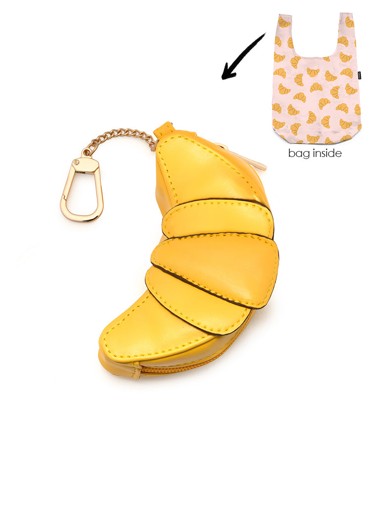 2-in-1 bag charm featuring Croissant shape and a shopper bag in a croissant print, displayed on a white background.