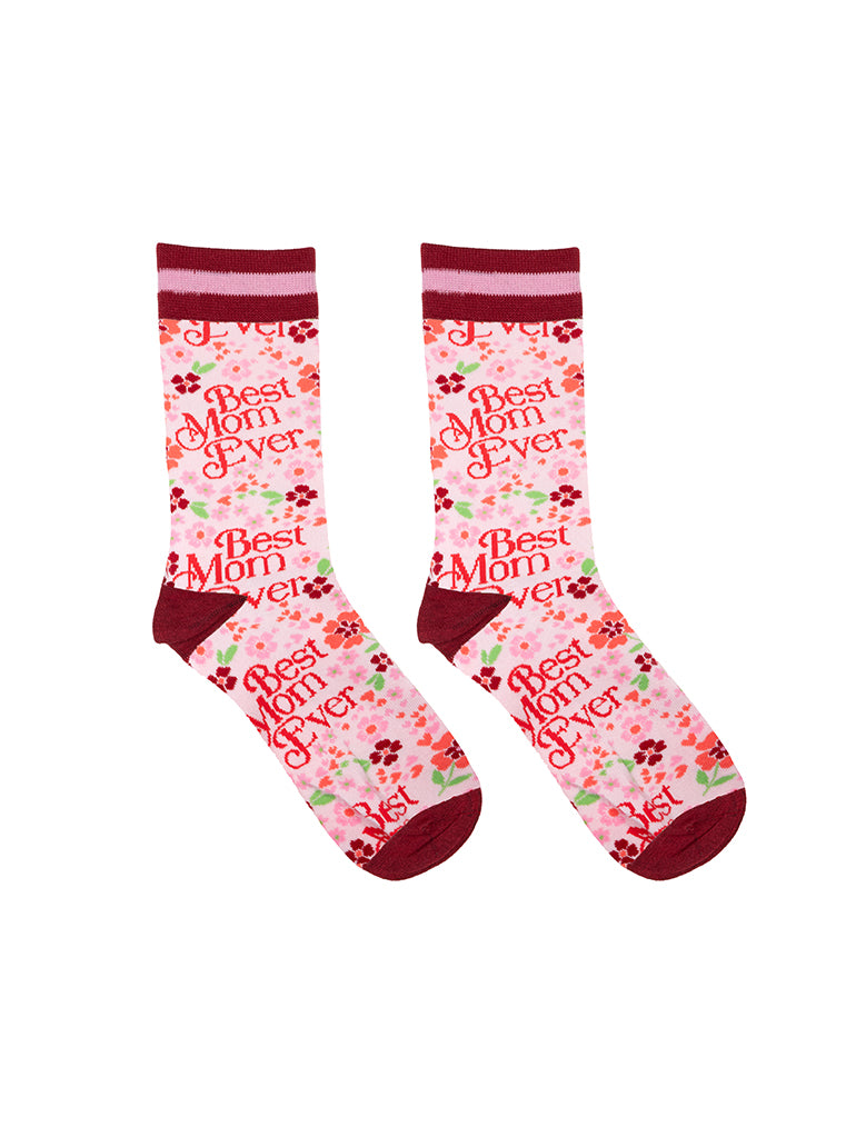 Pink and red women’s bamboo crew socks featuring a “Best Mom Ever” print with a floral pattern, shown a white background.
