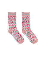 Pink and grey women’s bamboo crew socks featuring a delicate bow pattern print, shown on a white background.