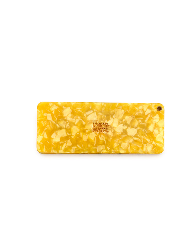 Yellow compact mirror featuring a salted butter print, perfect for on-the-go touch-ups, displayed on a white background.