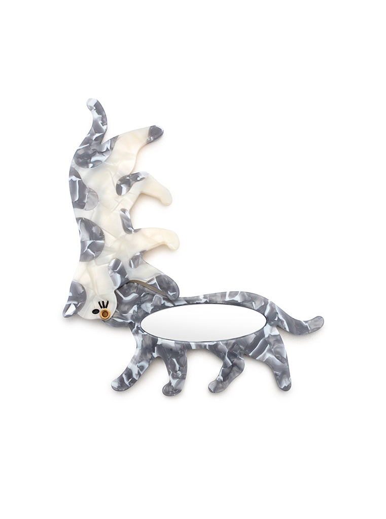 Compact mirror featuring a cat design, perfect for on-the-go touch-ups, displayed on a white background.