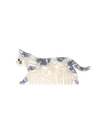 Hair comb featuring a white cat design, displayed on a white background.
