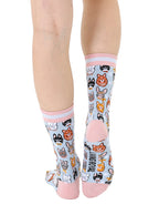 Women’s bamboo crew socks featuring a variety of cat face–themed patterns, shown worn on a person against a white background.
