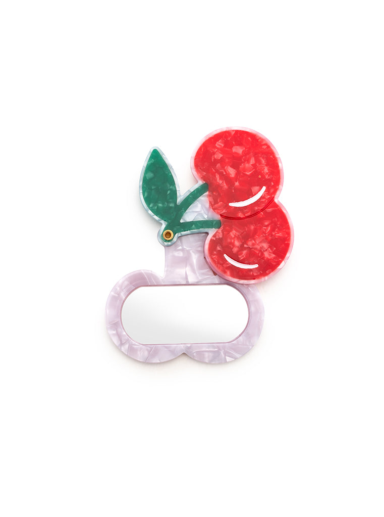 Compact mirror with a Cherry design, a perfect pocket-sized accessory, displayed on a white background.