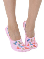 Pink socks with cowboy boots print worn by a person on a white background