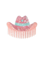 Hair comb featuring a pink cowgirl hat design, displayed on a white background.