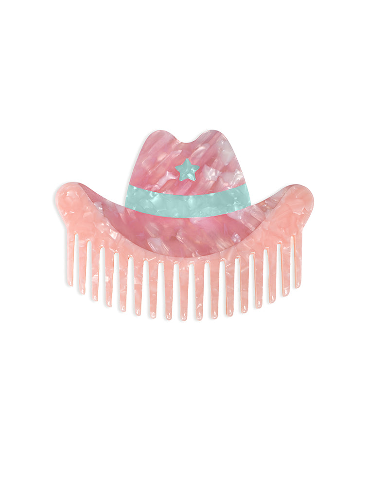 Hair comb featuring a pink cowgirl hat design, displayed on a white background.