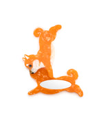 Compact mirror featuring orange dog design, perfect pocket mirror, displayed on a white background.