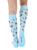 Lightblue padded compression socks featuring a white and brown ducks pattern, shown worn on a white background.