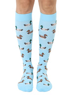 Lightblue padded compression socks featuring a white and brown ducks pattern, shown worn on a white background.