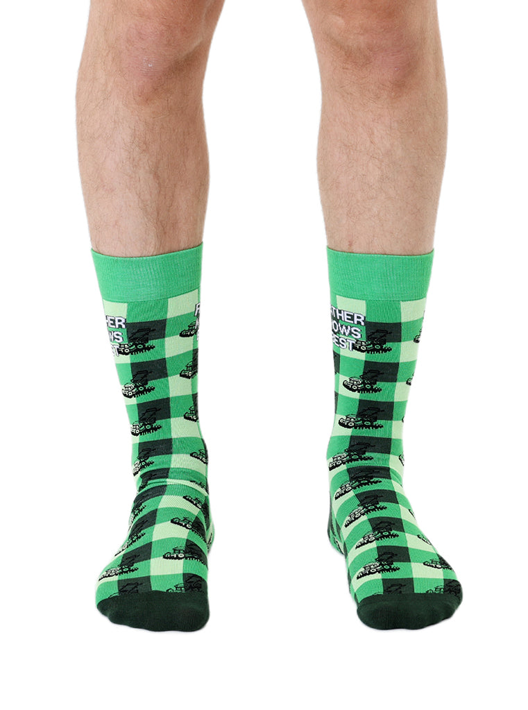 Black and Green men’s bamboo crew socks featuring a “Father Mows Best” design, shown worn against a white background.