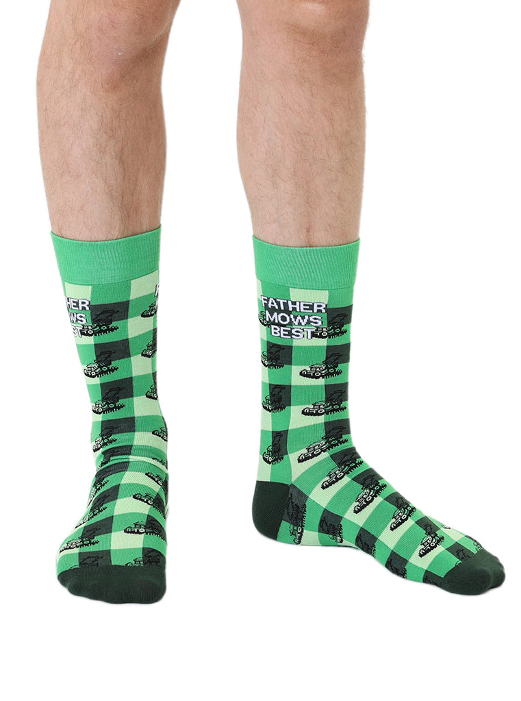 Black and Green men’s bamboo crew socks featuring a “Father Mows Best” design, shown worn against a white background.