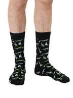 Black Men’s Bamboo Crew Socks with a fun fishing lure pattern. Worn on a crisp white background.