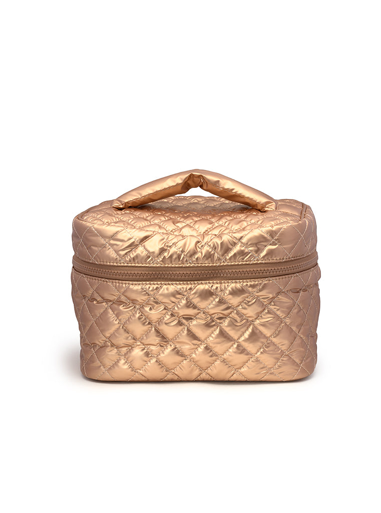 Gold cosmetic travel case display on a white background 