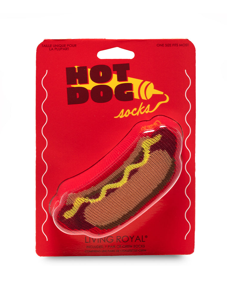 Packaged hot dog-shaped socks with 'Hot Dog Socks' text on a red background