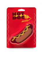 Packaged hot dog-shaped socks with 'Hot Dog Socks' text on a red background