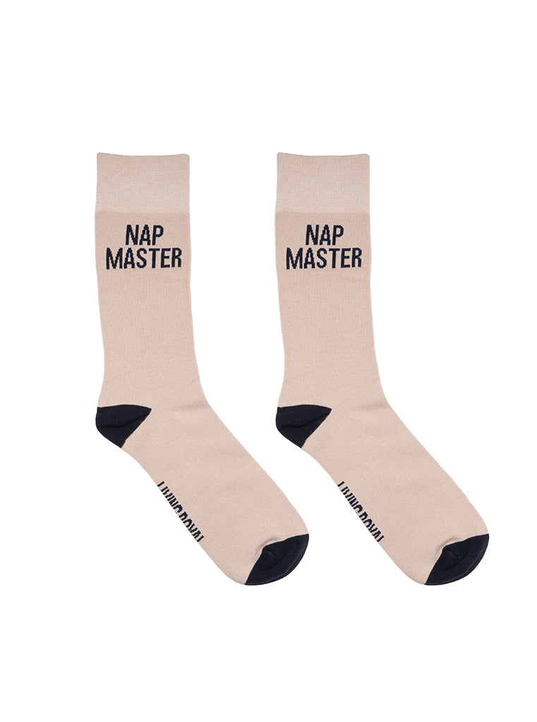Beige men’s bamboo crew socks featuring a “Nap Master” print, on a white background.