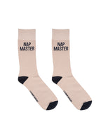 Beige men’s bamboo crew socks featuring a “Nap Master” print, on a white background.