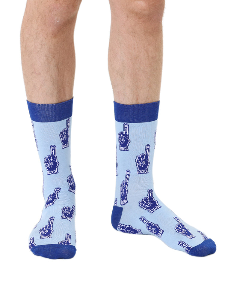 Blue color men’s bamboo crew socks featuring a fun “Number One Dad” print worn by a person on a white background