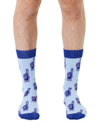 Blue color men’s bamboo crew socks featuring a fun “Number One Dad” print worn by a person on a white background