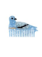 Hair comb featuring a pigeon design, displayed on a white background.