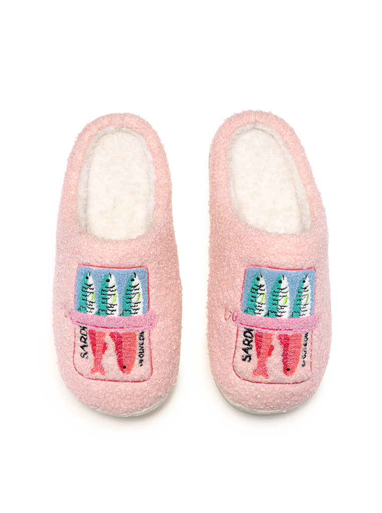 Pair of pink slippers with colorful text on a white background