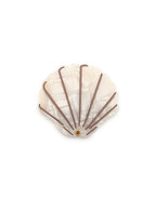 Compact mirror featuring a seashell design with a hinged mechanism, perfect for on-the-go use, displayed on a white background.