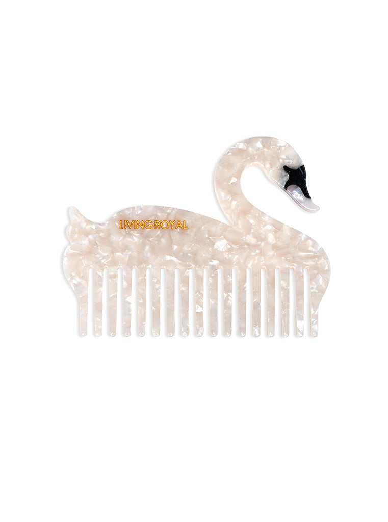 Hair comb featuring a swan design, displayed on a white background.