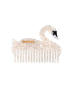 Hair comb featuring a swan design, displayed on a white background.