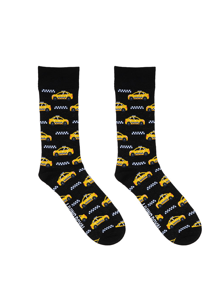 Black men’s bamboo crew socks with a yellow taxi print, on a white background.