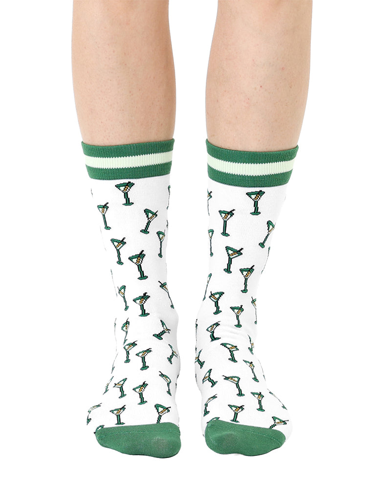 White and green women’s bamboo crew socks featuring a “Tini Time” cocktail-themed print, shown worn on a person against a white background.