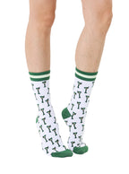 White and green women’s bamboo crew socks featuring a “Tini Time” cocktail-themed print, shown worn on a person against a white background.