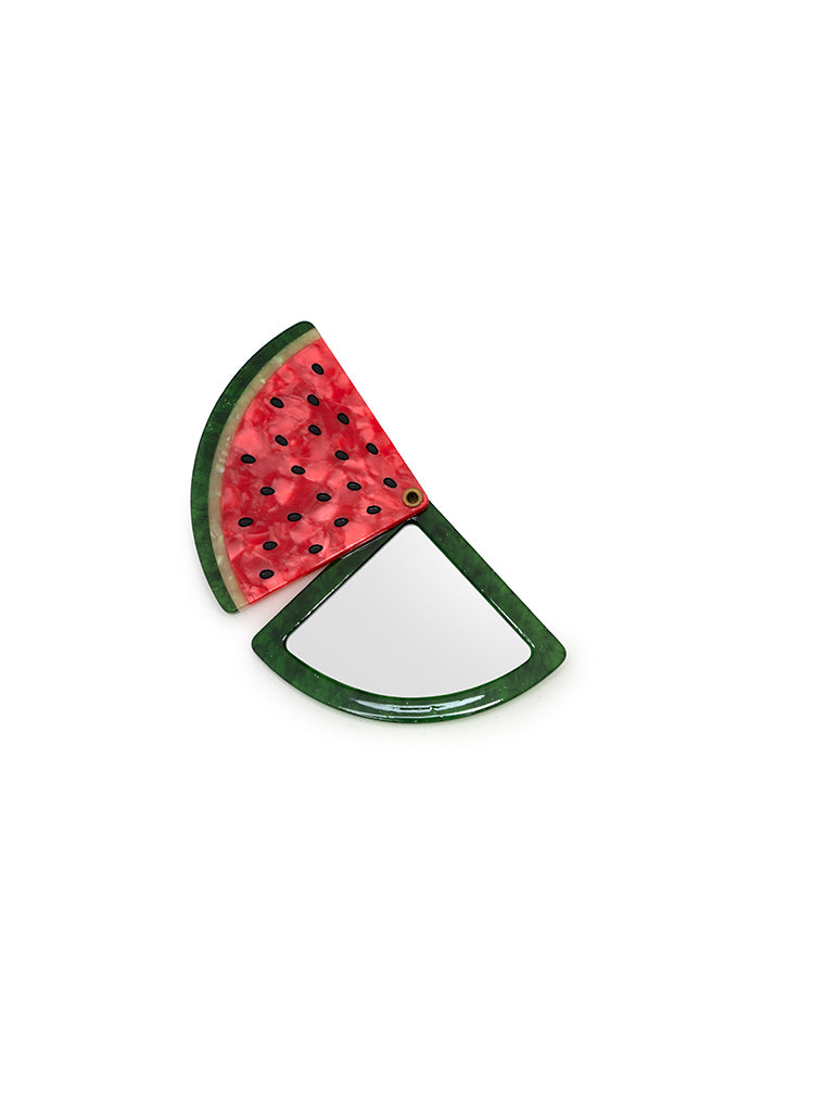 Compact mirror featuring a watermelon design with a hinged mechanism, perfect for on-the-go use, displayed on a white background.