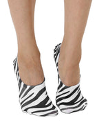 Black and white zebra print no-show ankle socks worn by a person on a white background.